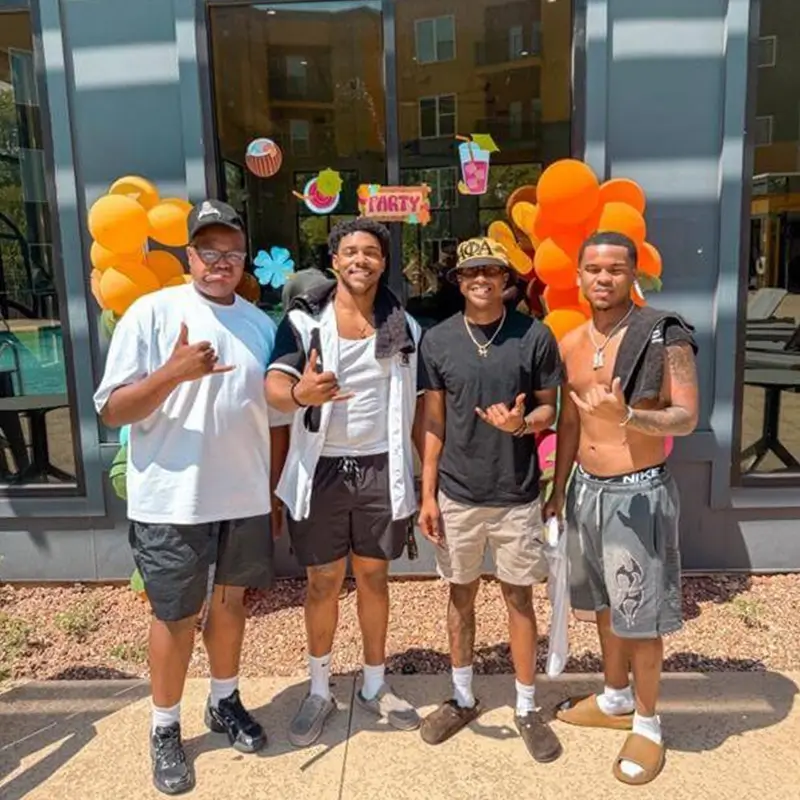 group of young men posing for a photo